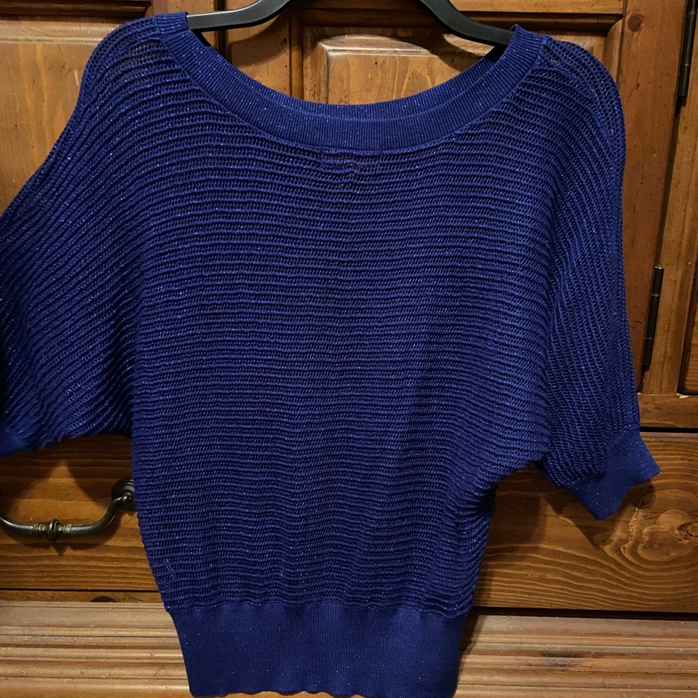 Super cute blue top.